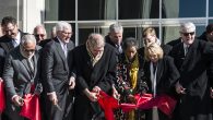 Gov. Phil Bryant, former governors William F. Winter and Haley Barbour, Myrile Evers, Katie Blount, and many others cut the ribbon in front of the new Two Mississippi Museums