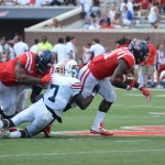Akeem Judd  gains yards for the rebels. (PHOTO BY: ARIEL COBBERT)