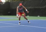 Ricardo Jorge returns a ball with a backhand.  (Photo by: Ariel Cobbert)