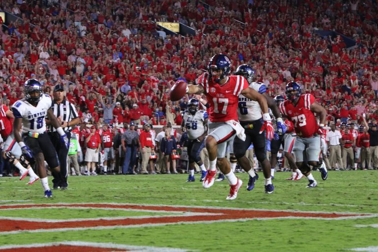 Rebels run past Memphis 48-28