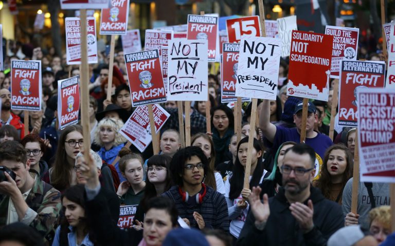 Anger over Trump explodes; protesters set fires, smash glass in 7 cities