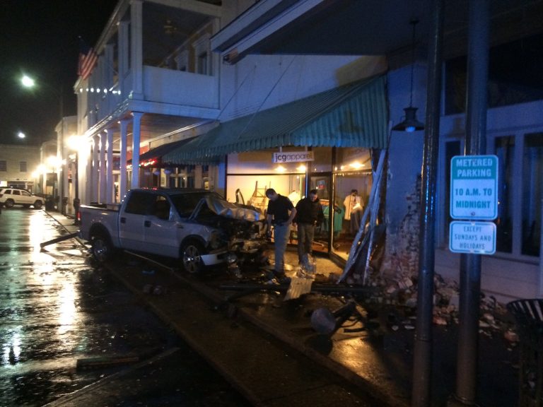 Driver crashes into storefront on Square