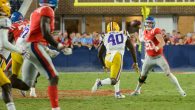 Shea Patterson tries to throw the ball to receiver A.J. Brown in the Rebels' 40-24 loss to LSU on Saturday night. Photo by Billy Schuerman