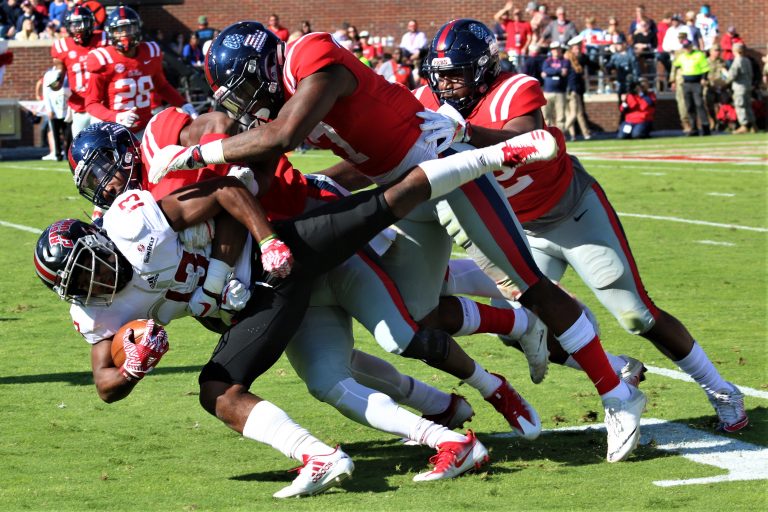Ragin’ Cajuns sent packing after Rebels dominate 50-22