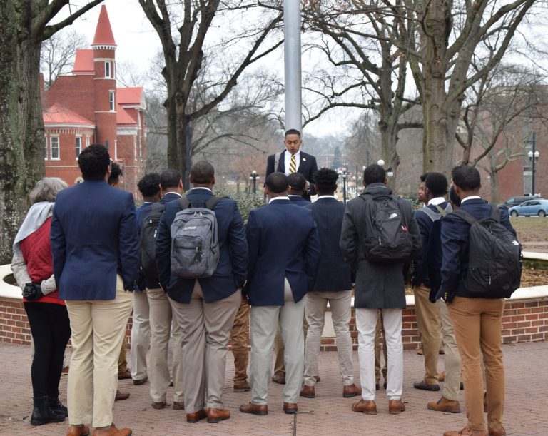 Men of Excellence lead walk honoring James Meredith