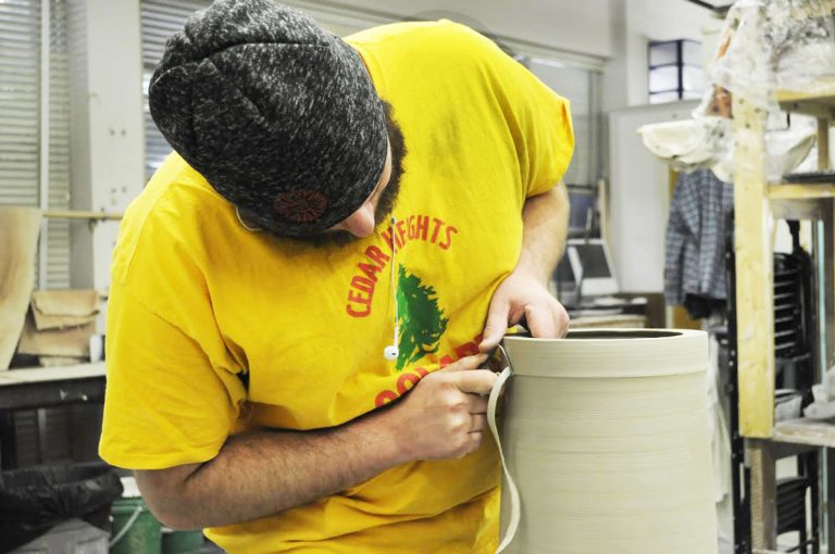 Student art group creates ceramics to sell during Double Decker