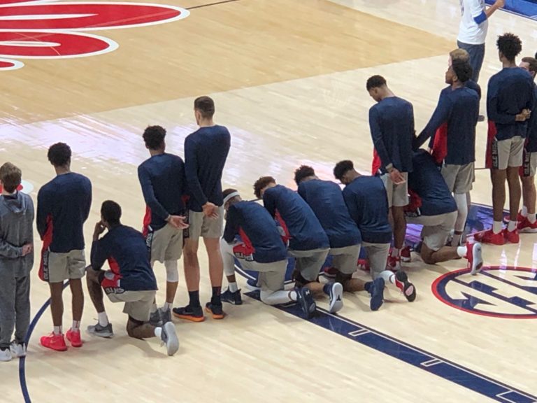 Ole Miss basketball players kneel during national anthem as neo-Confederate activists march on campus