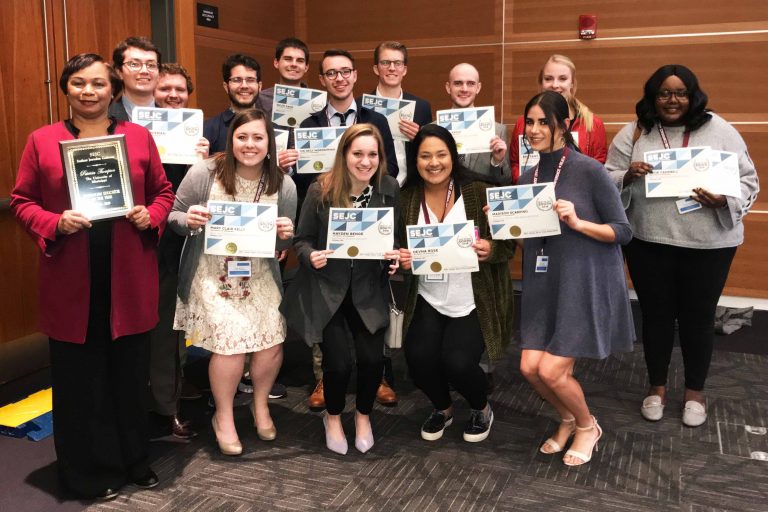 Assistant dean, students earn 21 awards at journalism conference